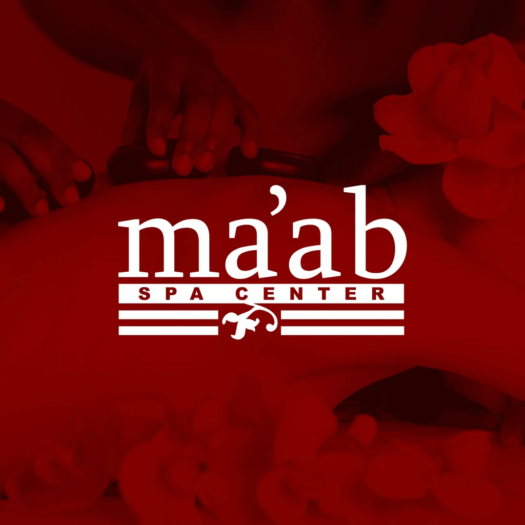 Ma'ab Spa Center logo on red