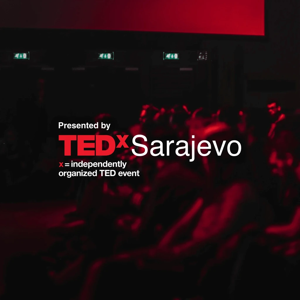 TEDxSarajevo title over a red-lit audience